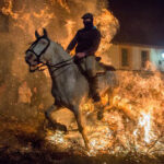 ugh fire in a Spanish village to protect against disease